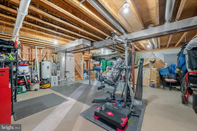 a view of a chairs and table in the balcony