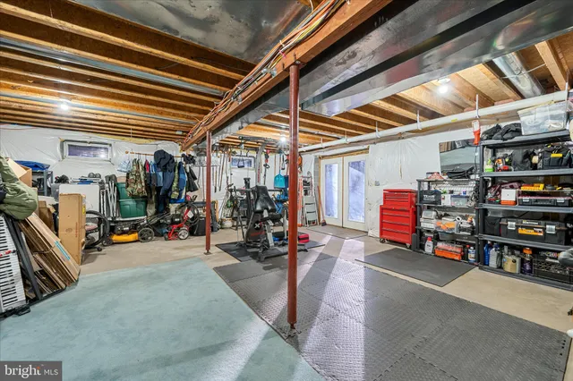 a view of balcony with wooden floor and fence