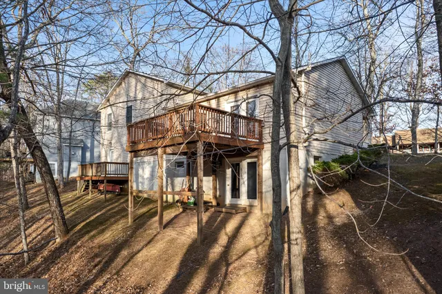 a view of a pathway with a backyard