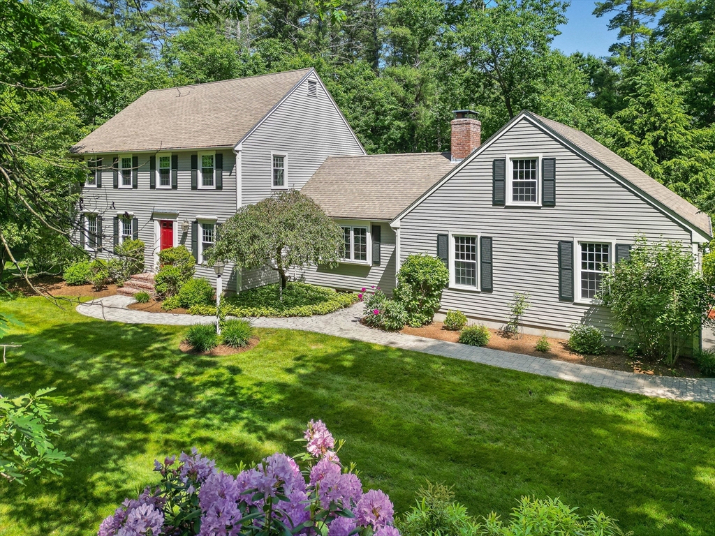 6 Arrowhead Farm Road Boxford, MA 01921 - Photo 1 of 42 a front view of a house with a yard and porch