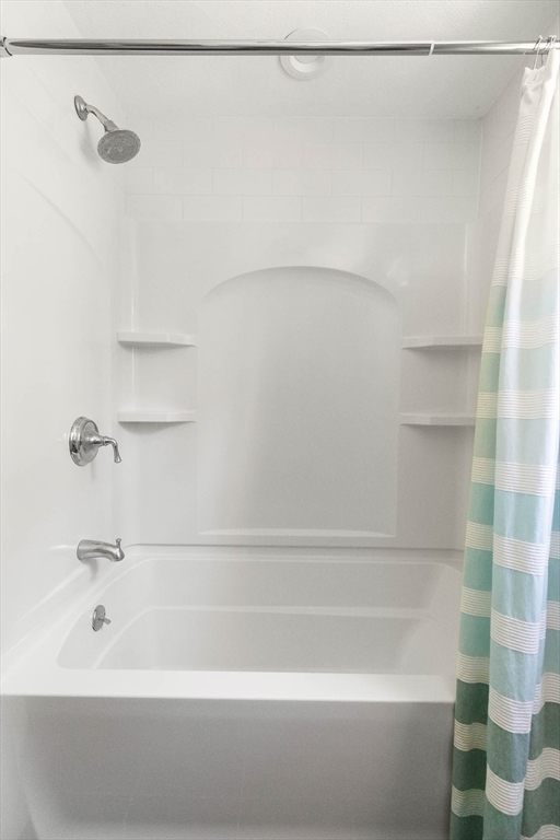 6 Arrowhead Farm Road Boxford, MA 01921 - Photo 36 of 42 a bathroom with a shower and a bath tub