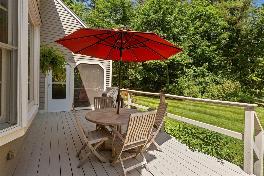 6 Arrowhead Farm Road Boxford, MA 01921 - Photo 5 of 42 a view of a deck with furniture and wooden deck