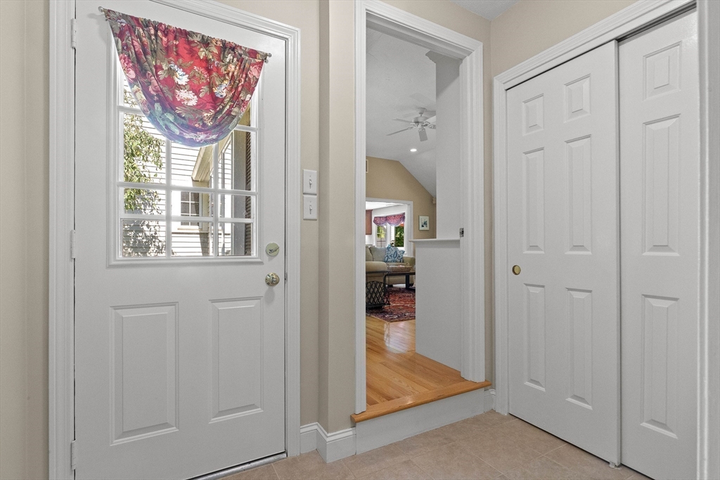 6 Arrowhead Farm Road Boxford, MA 01921 - Photo 9 of 42 a view of a hallway with bathroom and front door