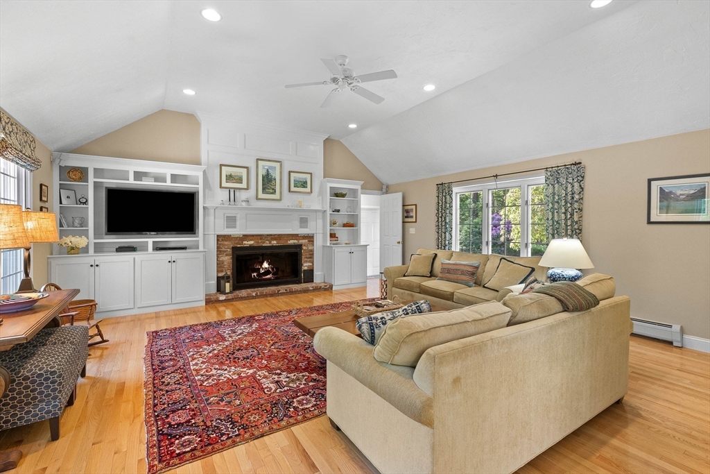 6 Arrowhead Farm Road Boxford, MA 01921 - Photo 10 of 42 a living room with furniture and a flat screen tv