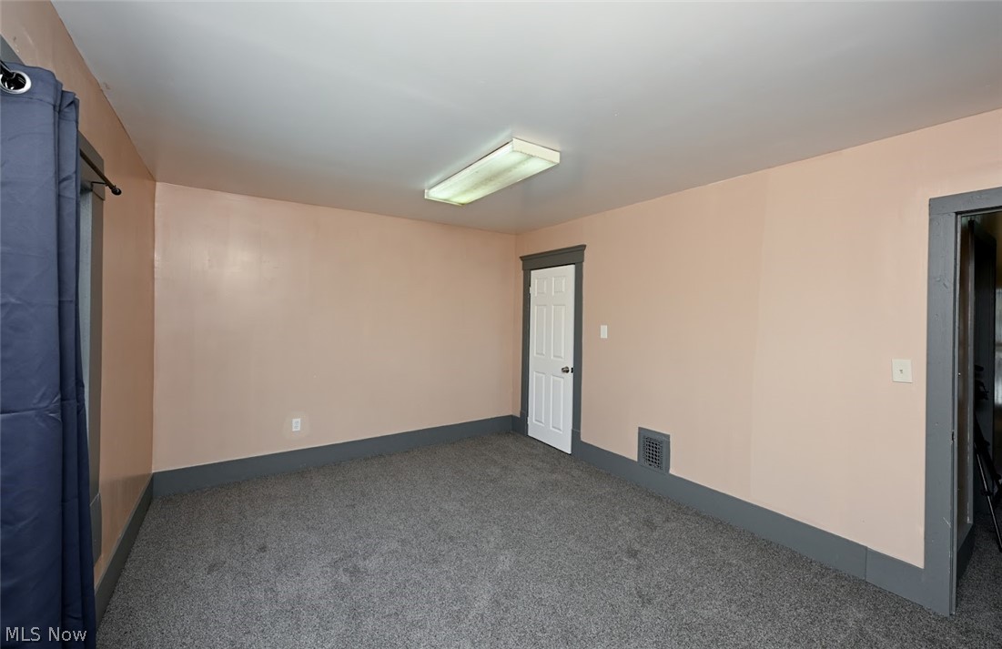 868 North Main Street Akron, OH 44310 - Photo 15 of 30 Carpeted empty room with baseboards