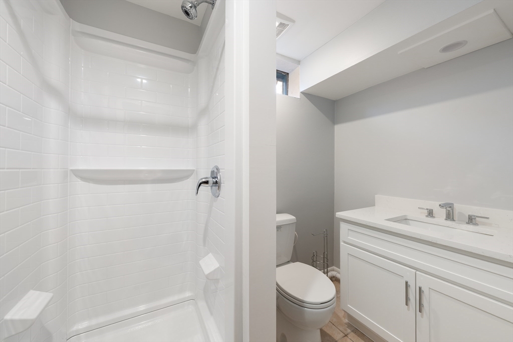 5 Lanes End Natick, MA 01760 - Photo 21 of 27 a bathroom with a granite countertop sink toilet and shower