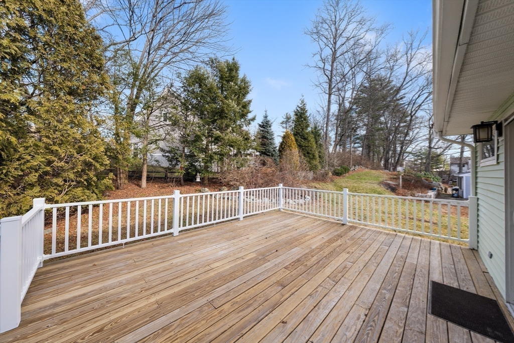 5 Lanes End Natick, MA 01760 - Photo 23 of 27 a view of a deck with a yard