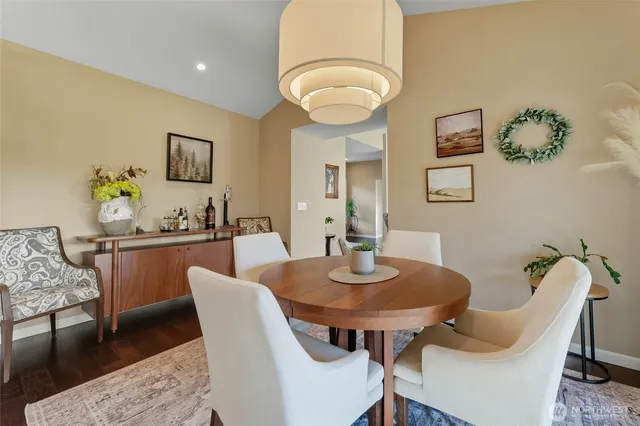 a view of a dining room with furniture