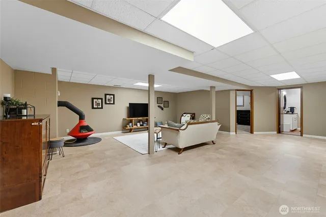 a bed room with furniture and air conditioner vent