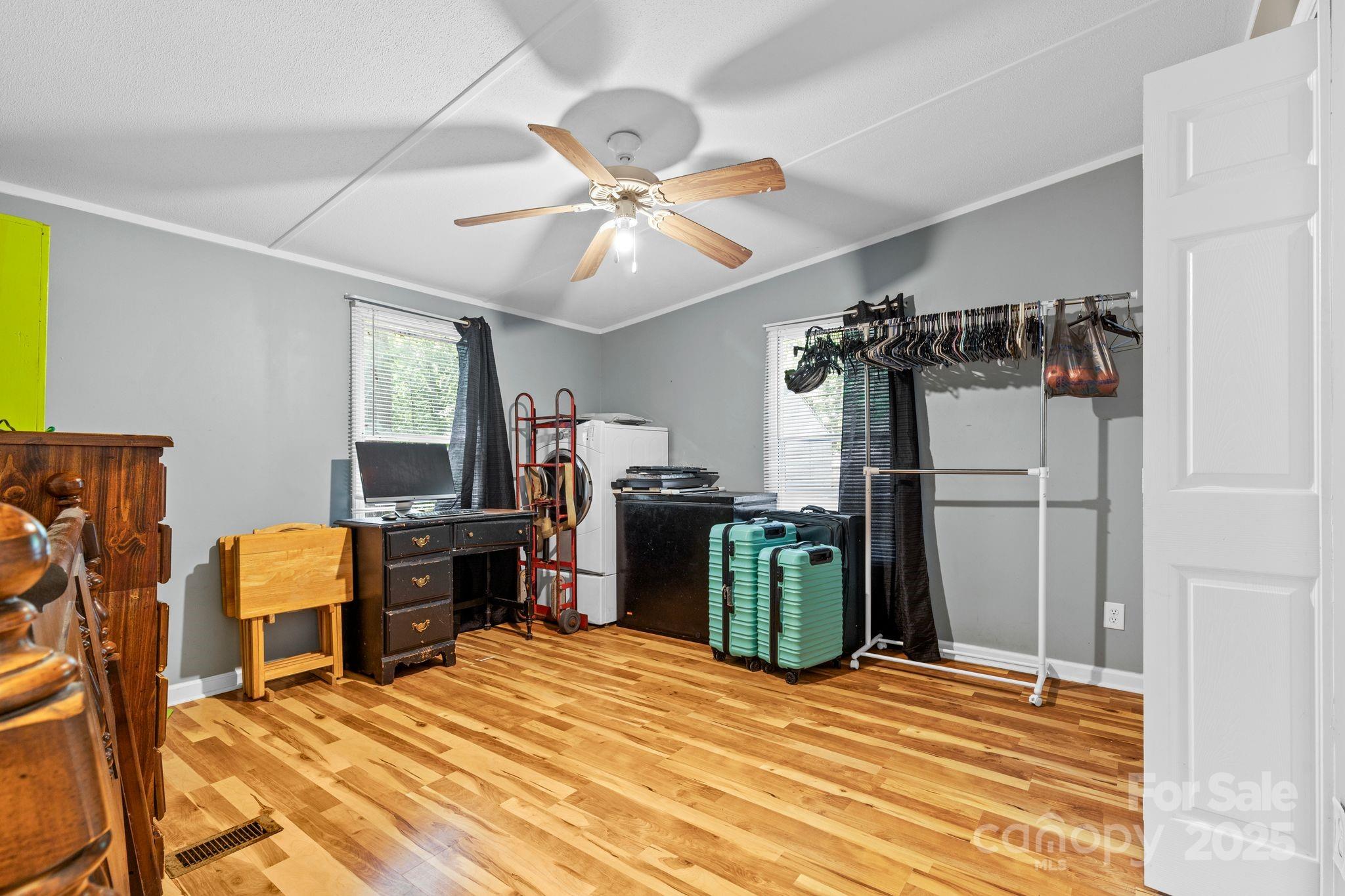 1902 Rock Hollar Road Stanley, NC 28164 - Photo 13 of 27 a bedroom with furniture and a window