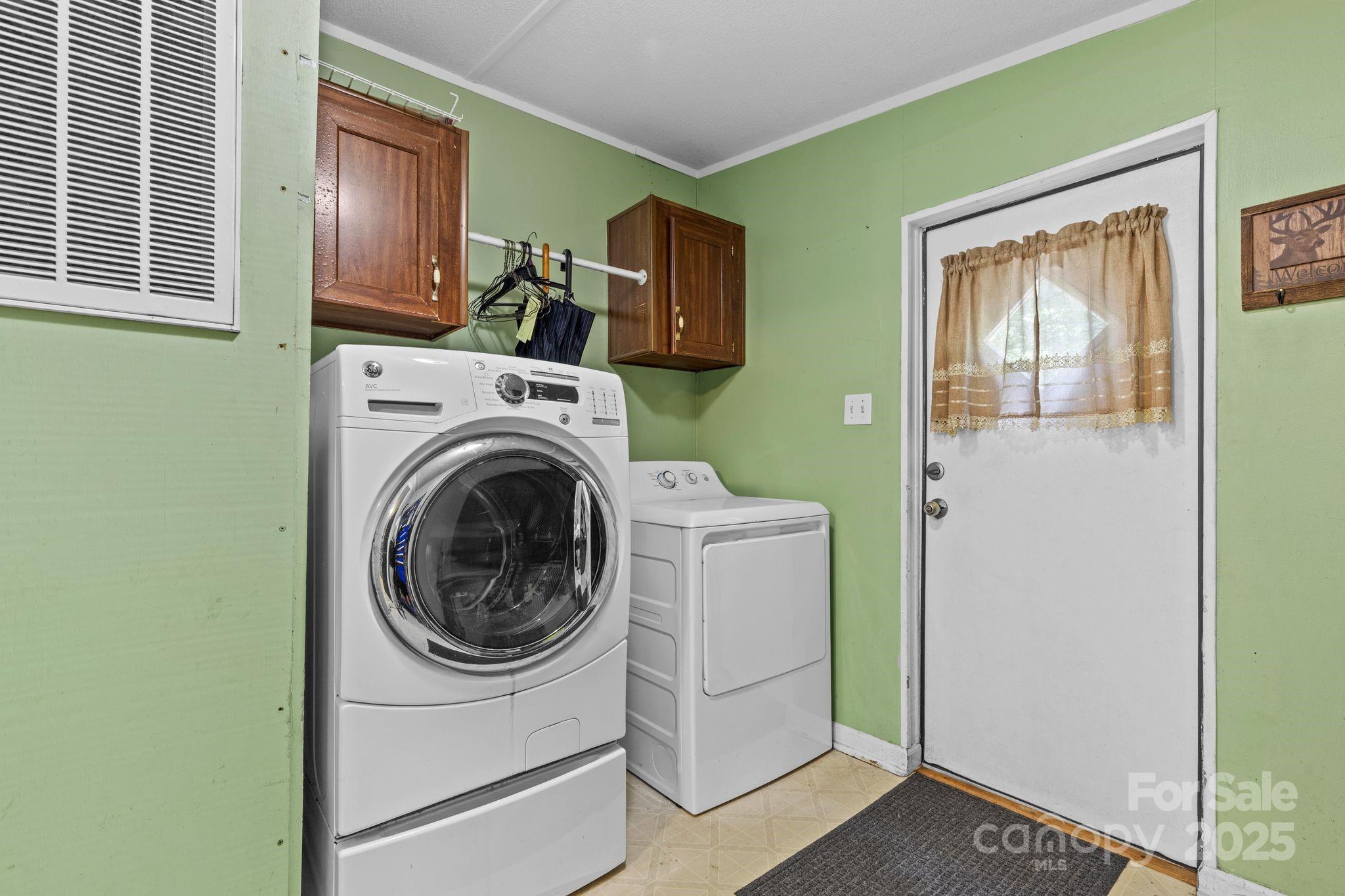 1902 Rock Hollar Road Stanley, NC 28164 - Photo 15 of 27 a utility room with dryer and washer