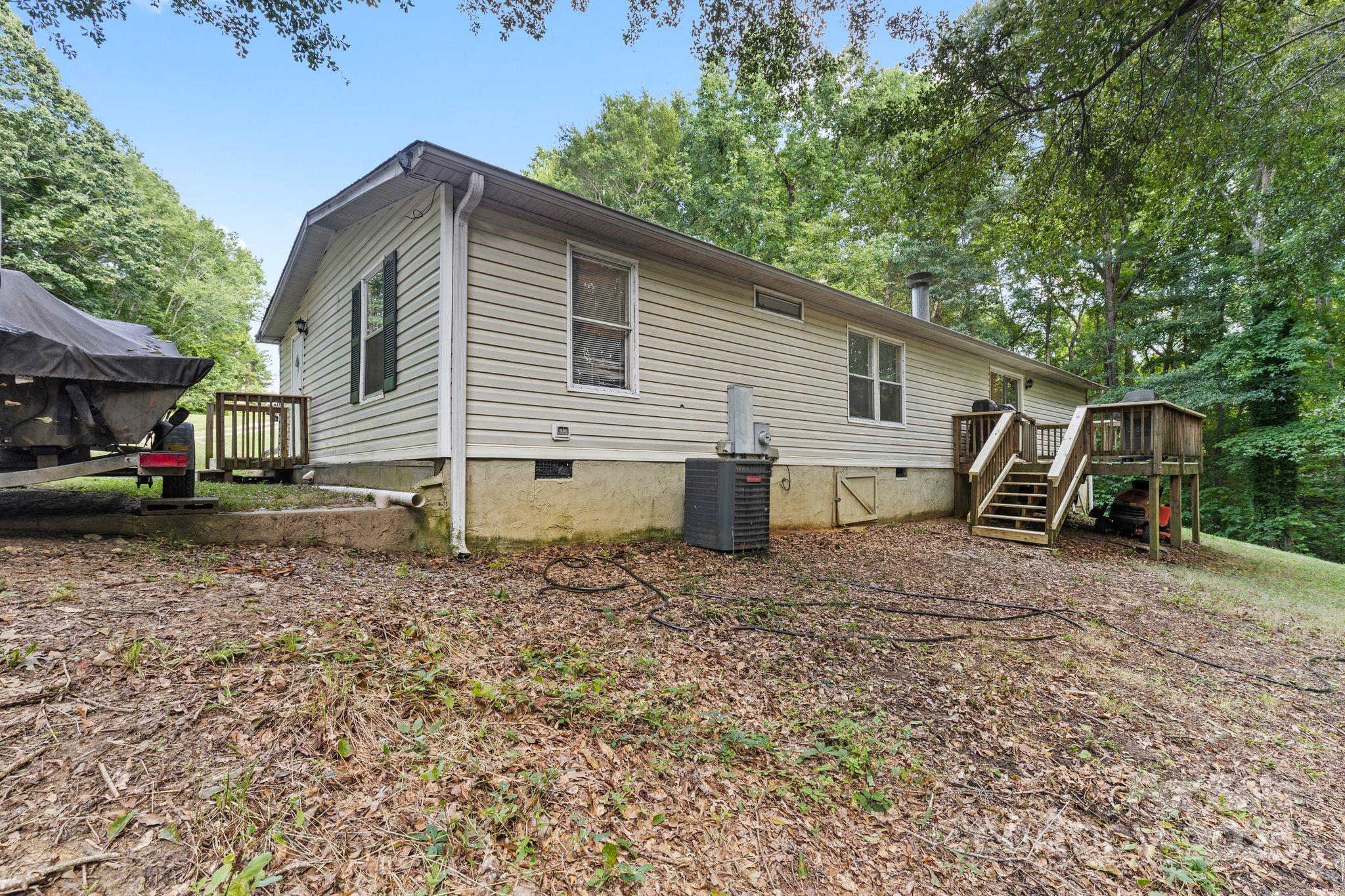 1902 Rock Hollar Road Stanley, NC 28164 - Photo 17 of 27 a view of back yard of the house