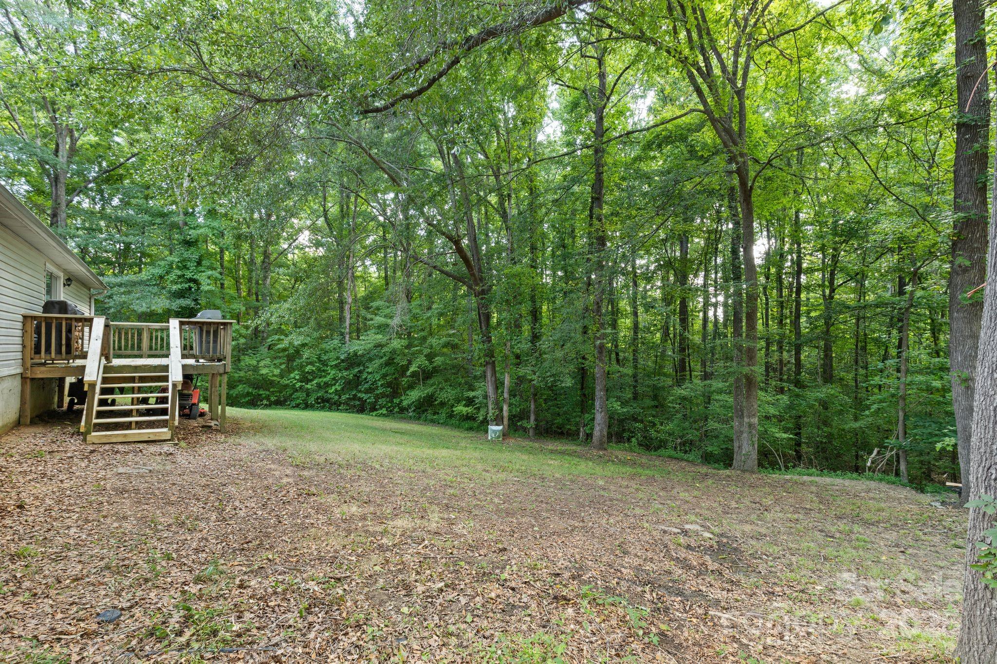 1902 Rock Hollar Road Stanley, NC 28164 - Photo 20 of 27 a view of a backyard with furniture
