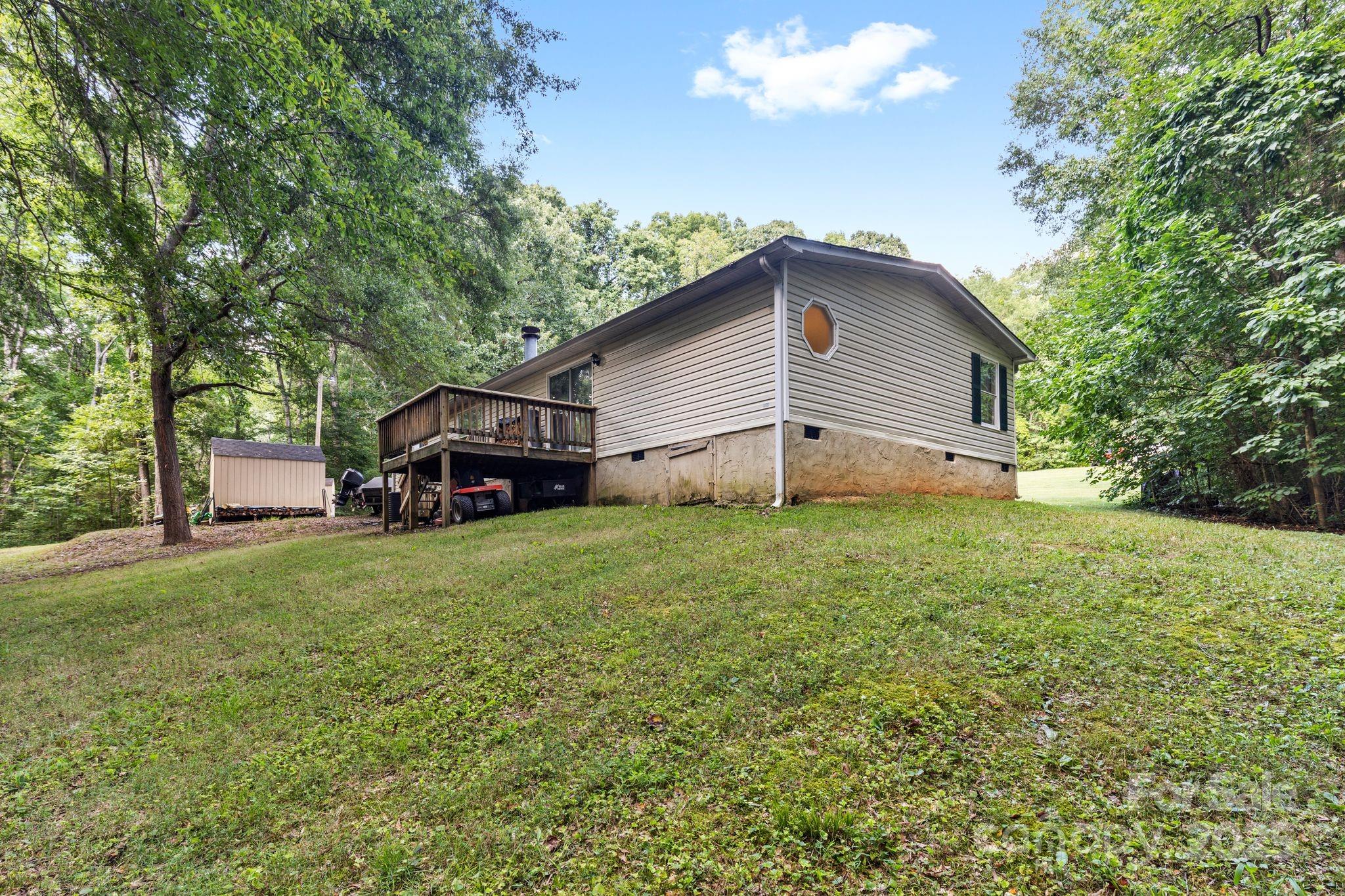 1902 Rock Hollar Road Stanley, NC 28164 - Photo 25 of 27 a house view with a garden space