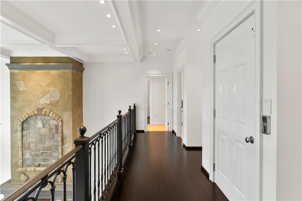 1775 Double Springs Church Road Monroe, GA 30656 - Photo 23 of 91 a view of a hallway with wooden floor and staircase