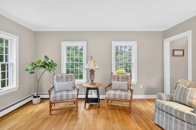 a bed room with a bed window and a couch