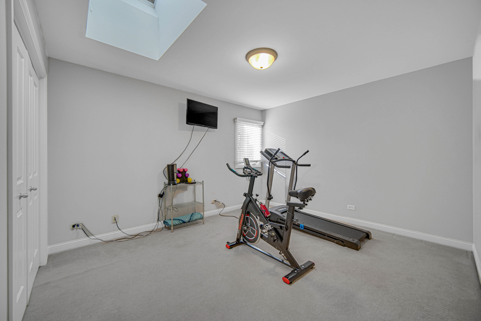 25216 Round Barn Road Plainfield, IL 60585 - Photo 21 of 31 a view of a room with gym equipment