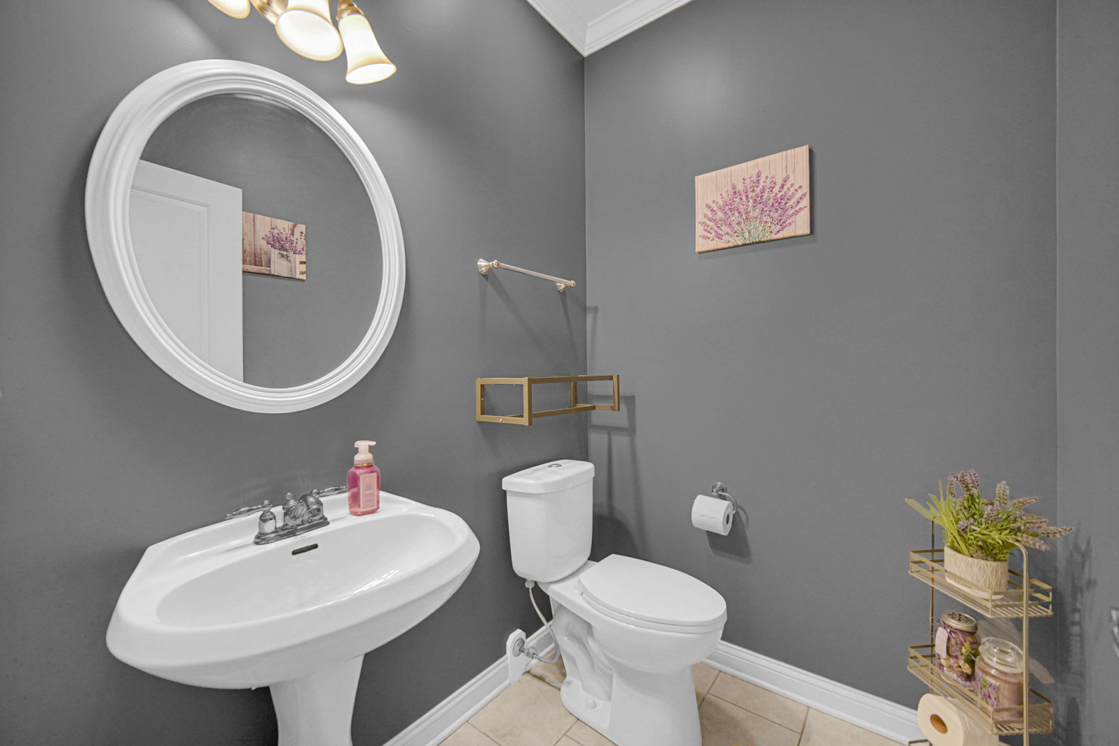 25216 Round Barn Road Plainfield, IL 60585 - Photo 25 of 31 a bathroom with a toilet sink and mirror