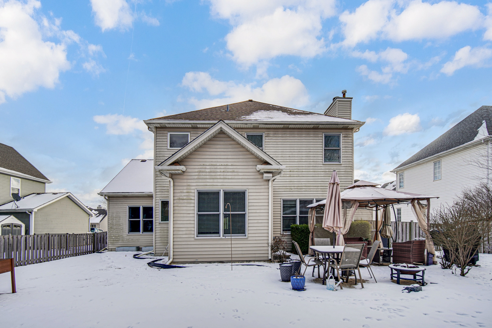 25216 Round Barn Road Plainfield, IL 60585 - Photo 30 of 31 a view of house with chair and tables