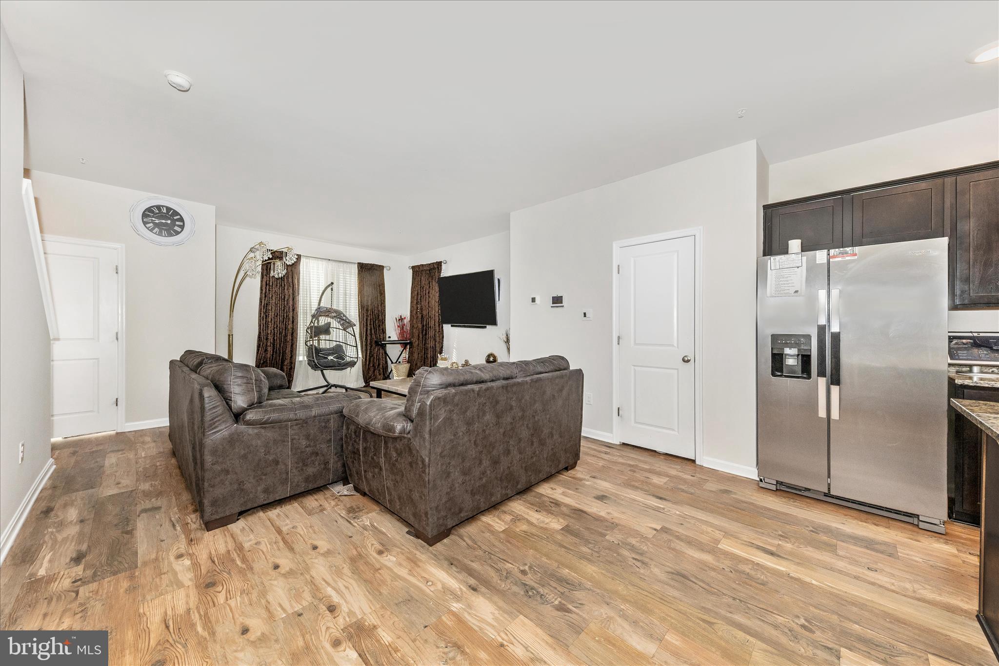 8648 Walter Martz Road Frederick, MD 21702 - Photo 16 of 50 a living room with furniture and a refrigerator