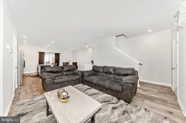 a living room with furniture and a couch