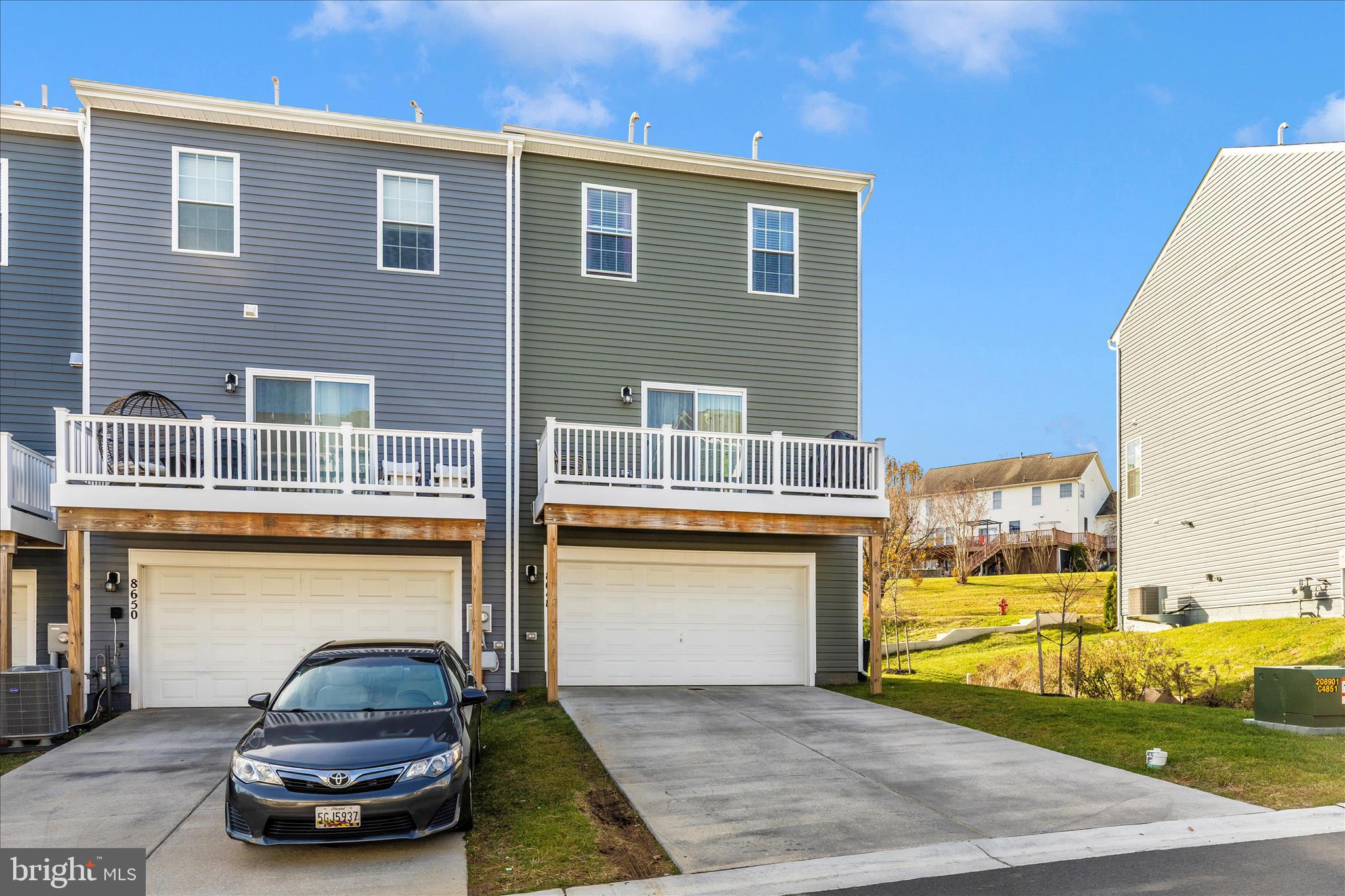 8648 Walter Martz Road Frederick, MD 21702 - Photo 38 of 50 a car parked in front of a brick house