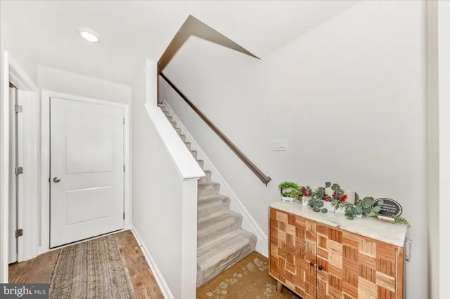 a view of entryway with wooden floor
