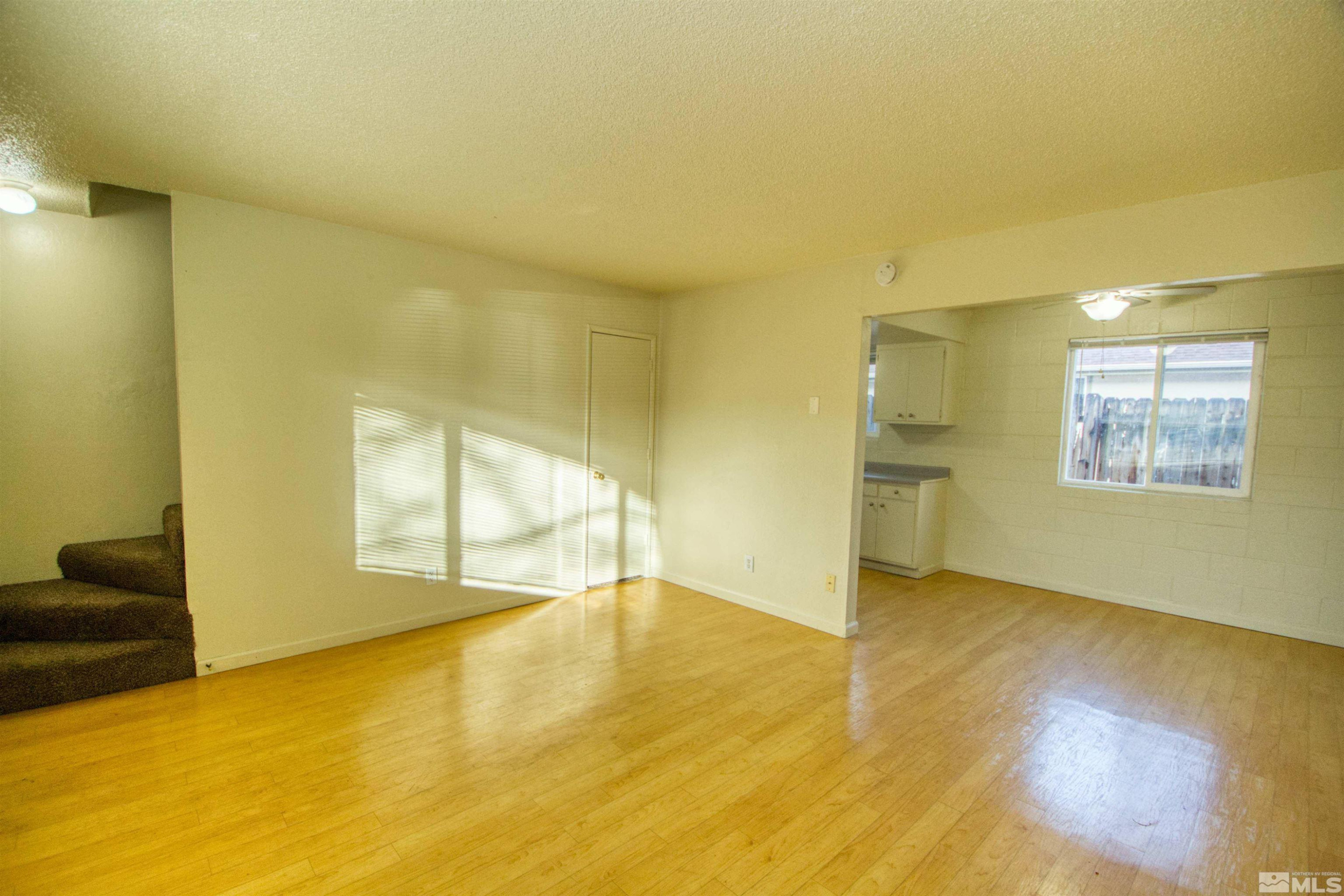 511 Country Village Drive, Unit 22 Carson City, NV 89701 - Photo 2 of 11 a view of an empty room and window