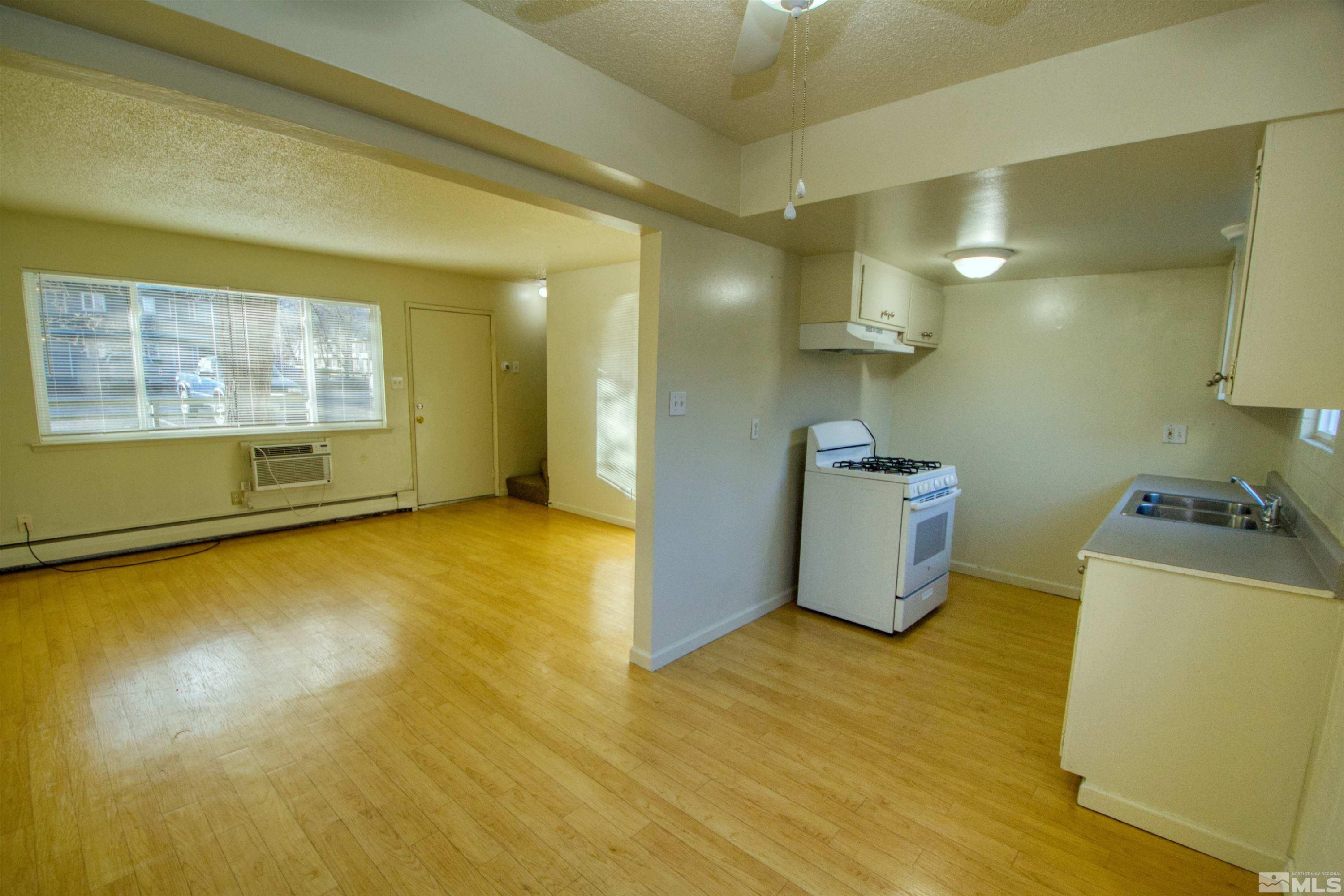 511 Country Village Drive, Unit 22 Carson City, NV 89701 - Photo 3 of 11 a view of a room with a kitchen