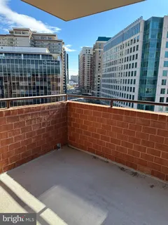 a view of city with tall buildings