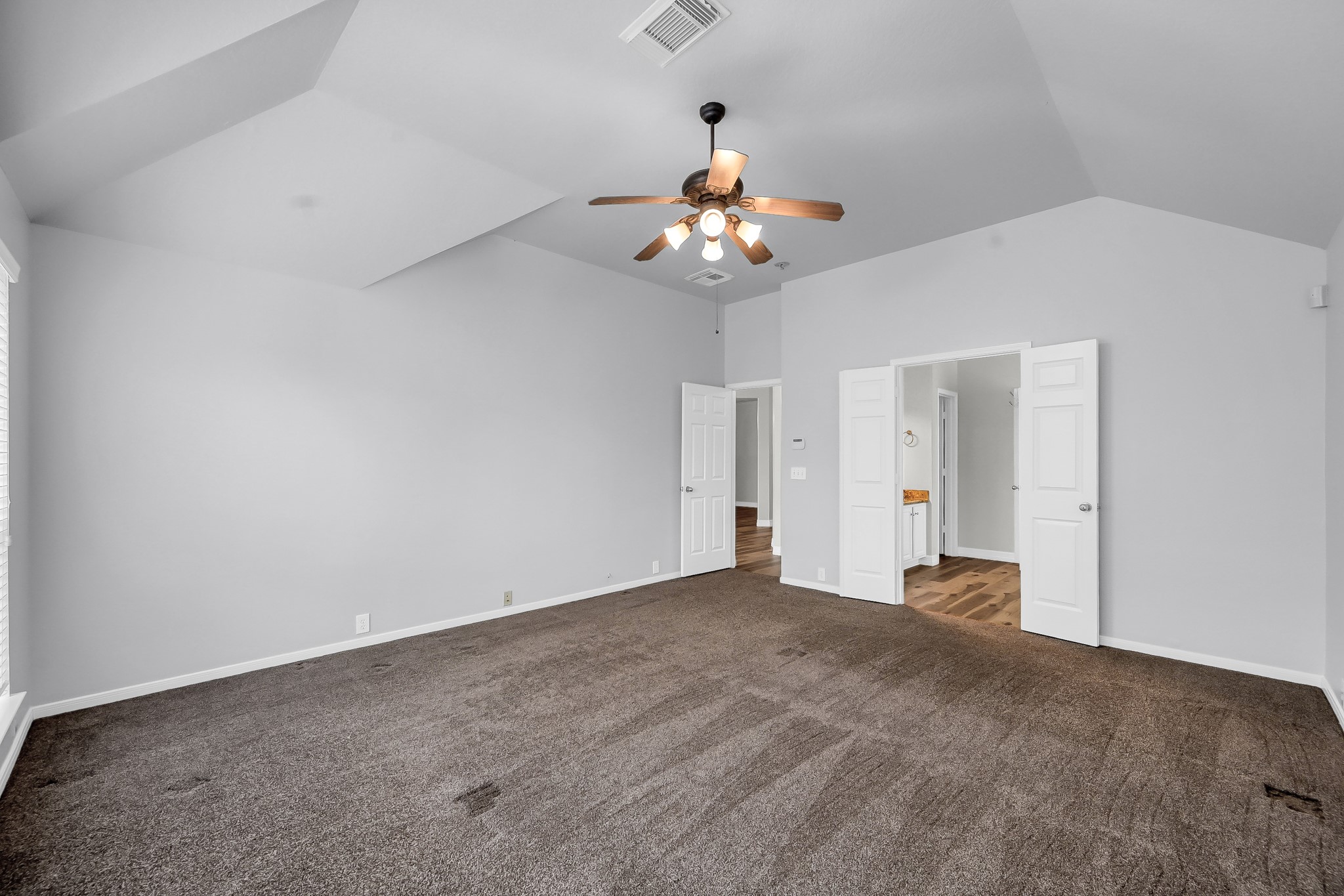 2906 Reynolds Creek Drive Spring, TX 77388 - Photo 21 of 38 a view of an empty room with chandelier fan