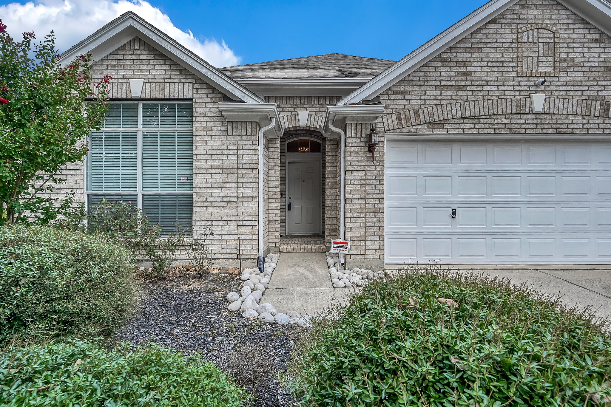 2906 Reynolds Creek Drive Spring, TX 77388 - Photo 3 of 38 a front view of a house with garden
