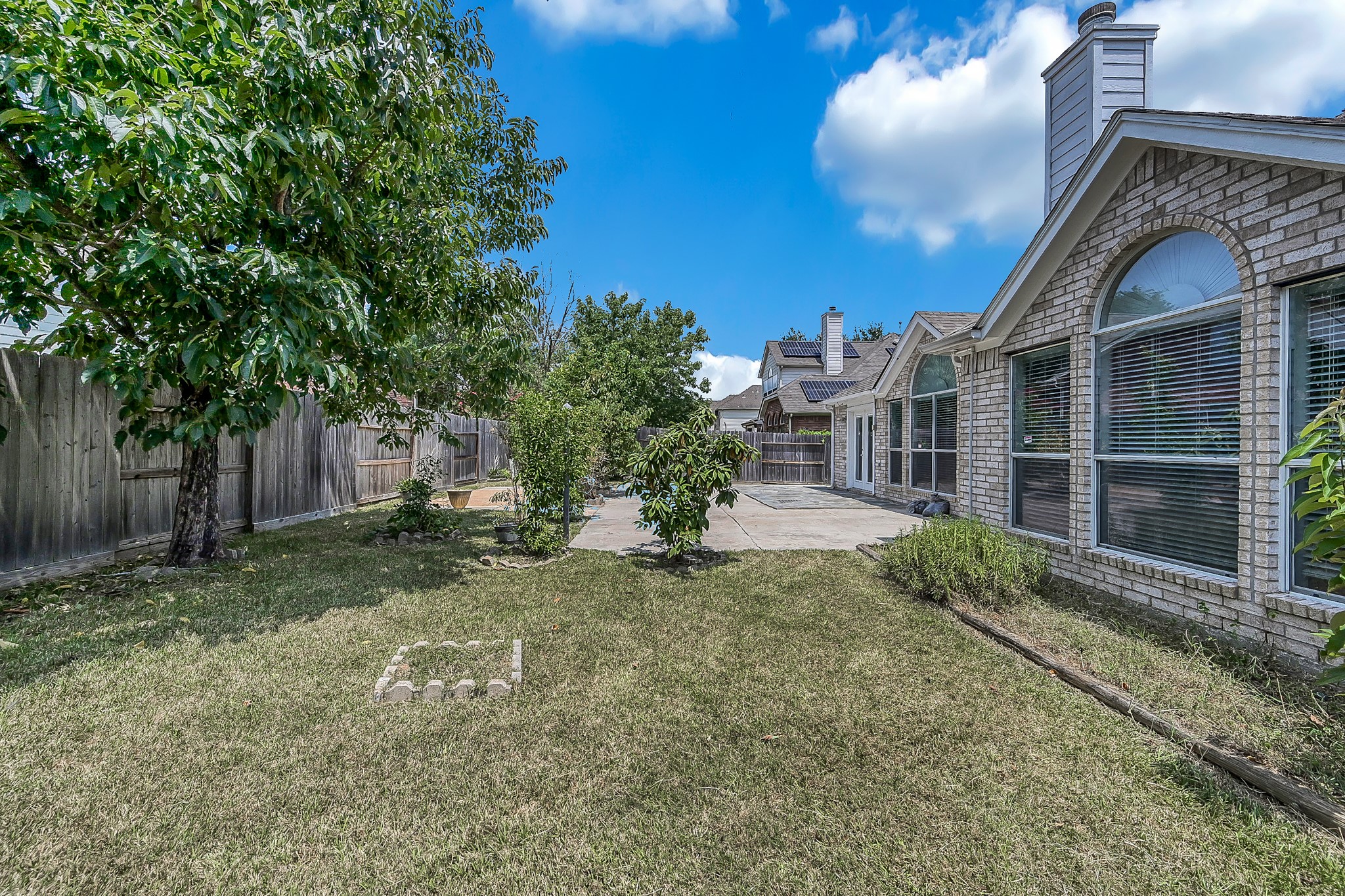 2906 Reynolds Creek Drive Spring, TX 77388 - Photo 35 of 38 a view of a house with a yard
