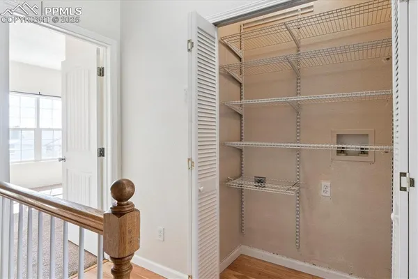 a view of entryway with wooden floor