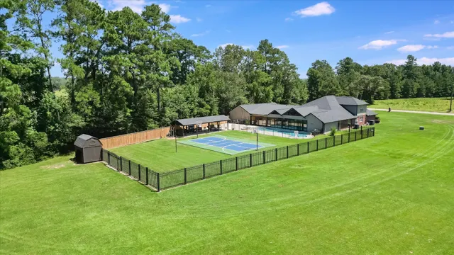 a view of a two chairs in the garden