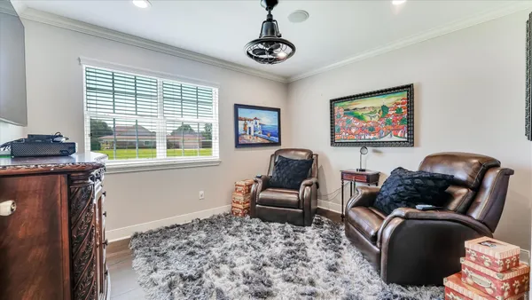 a living room with furniture or couch and a fireplace