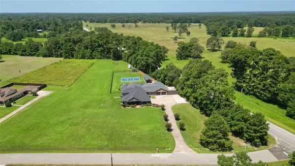 $899,900 | 65 County Road 2209N, Cleveland, TX 77327