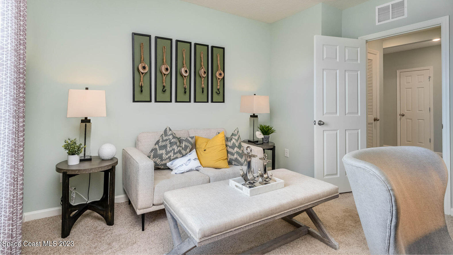 4954 Quartz Place Grant-Valkaria, FL 32949 - Photo 20 of 48 a living room with furniture