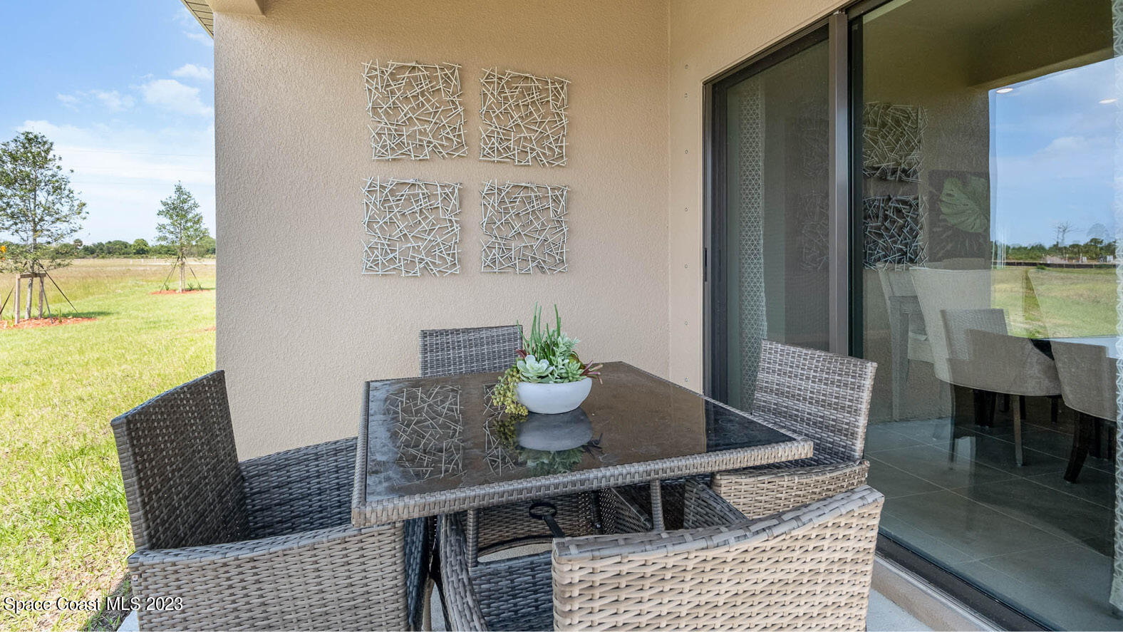 4954 Quartz Place Grant-Valkaria, FL 32949 - Photo 21 of 48 a view of a dining room with furniture