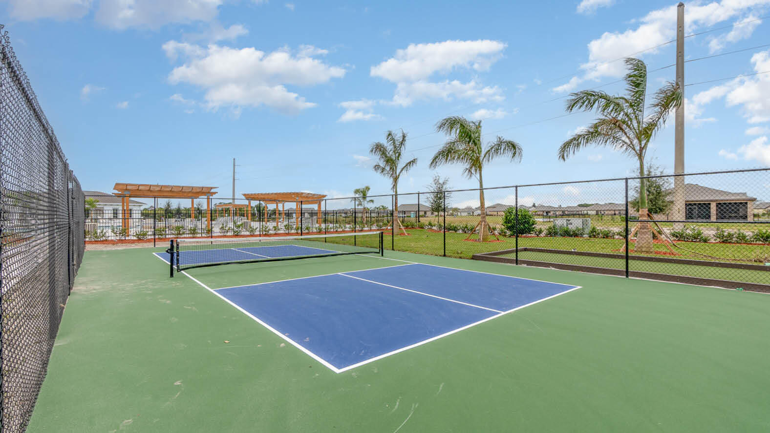 4954 Quartz Place Grant-Valkaria, FL 32949 - Photo 43 of 48 a view of tennis court