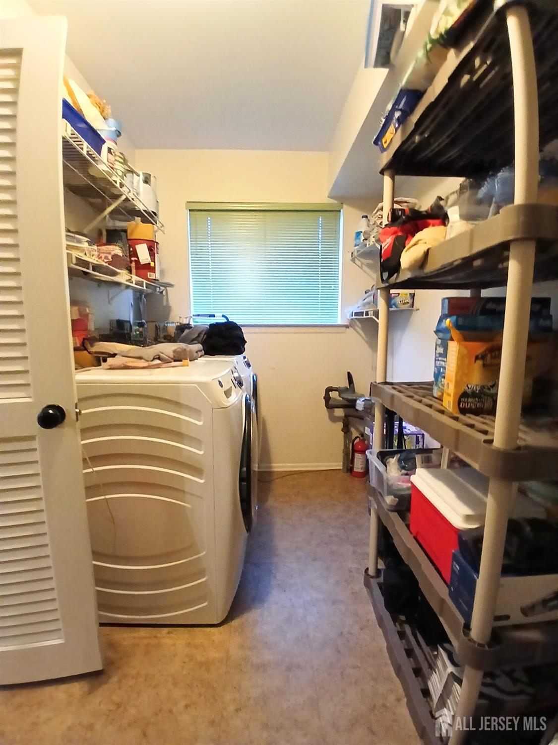 119 Nightingale Court Old Bridge, NJ 08857 - Photo 8 of 18 a room with storage and utility