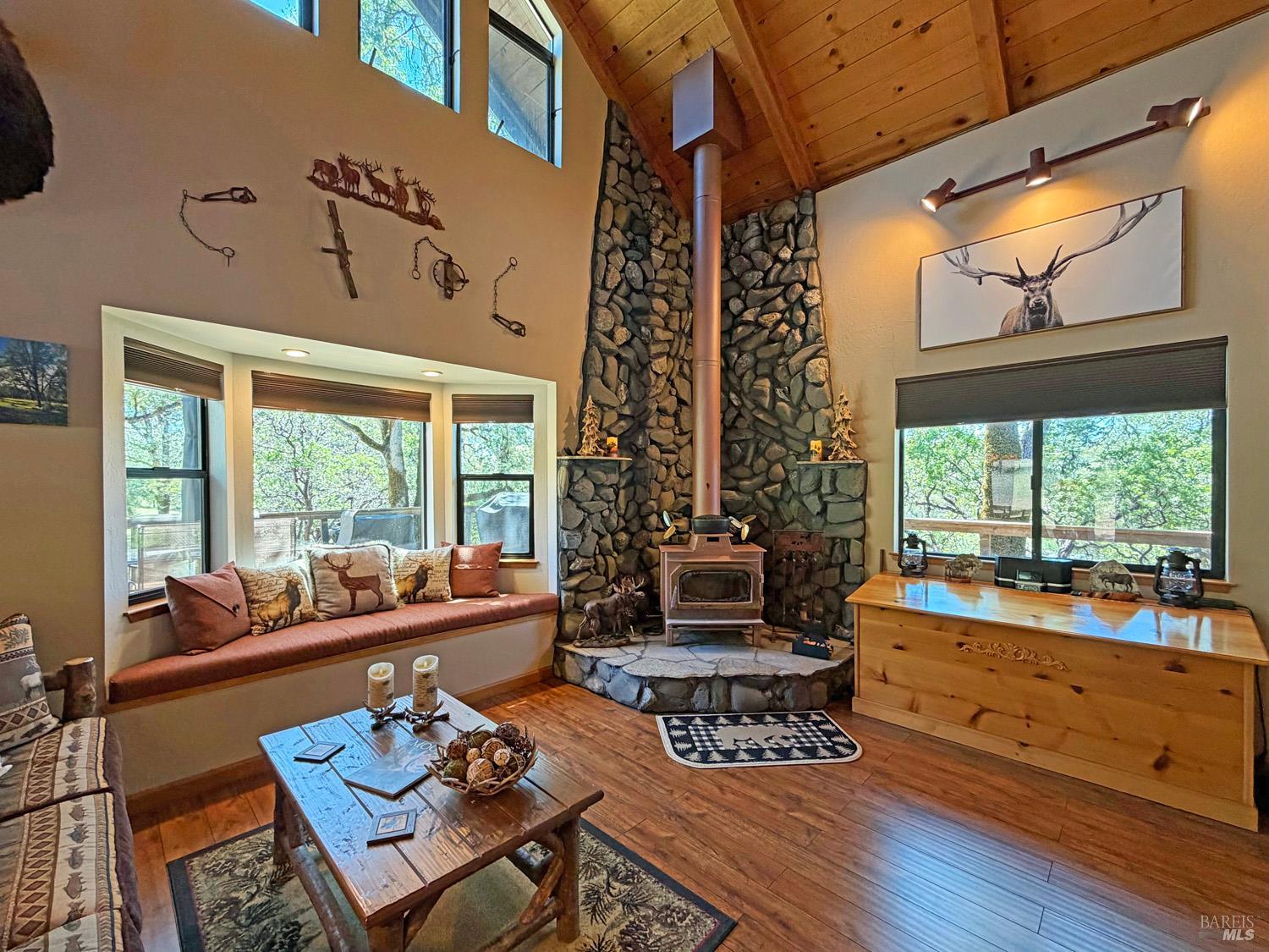 31312 High Point Road Potter Valley, CA 95469 - Photo 13 of 58 a living room with furniture and a large window