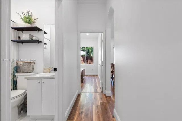 a view of a workspace with furniture