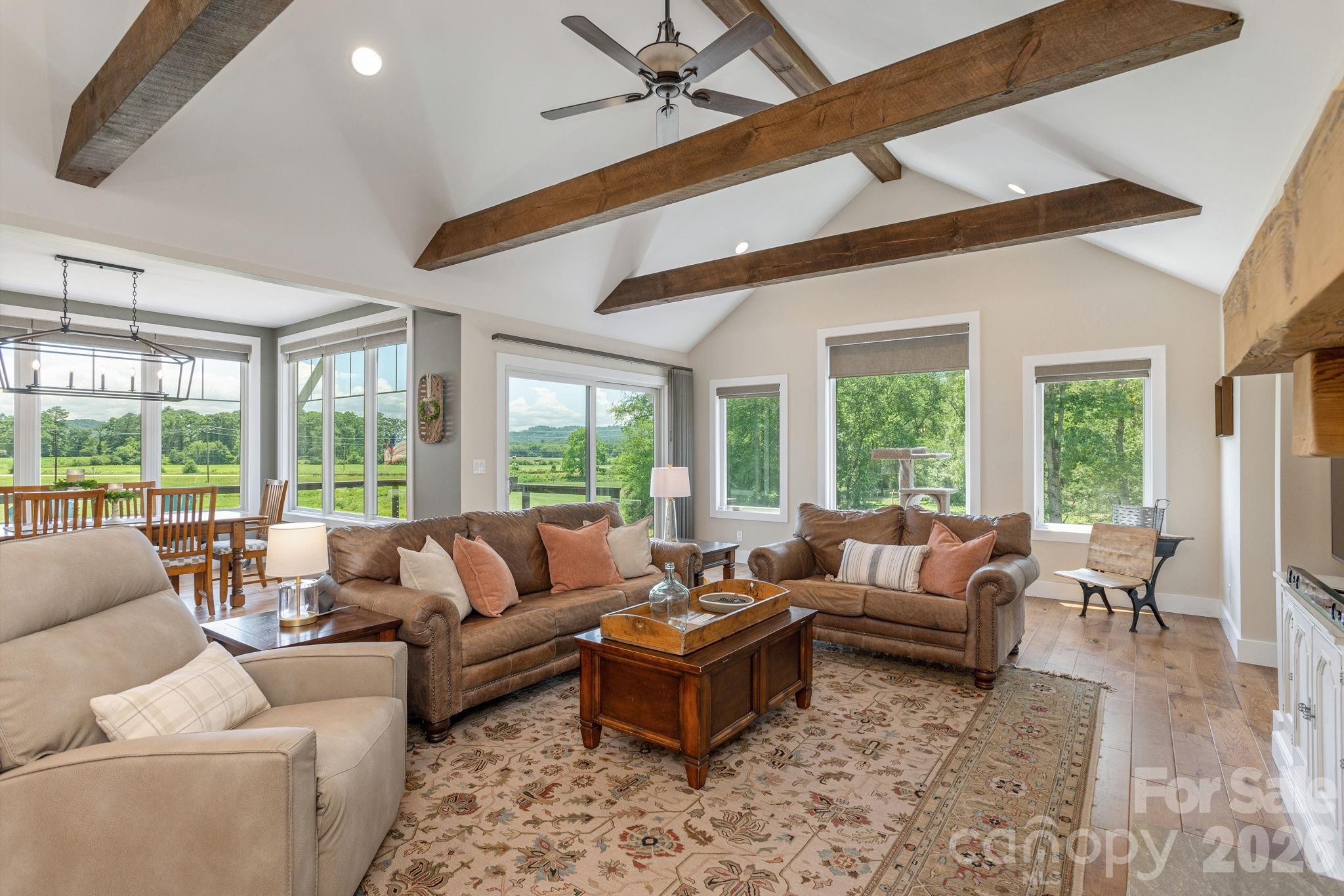 16 School House Road Mills River, NC 28759 - Photo 13 of 48 a living room with furniture and large windows