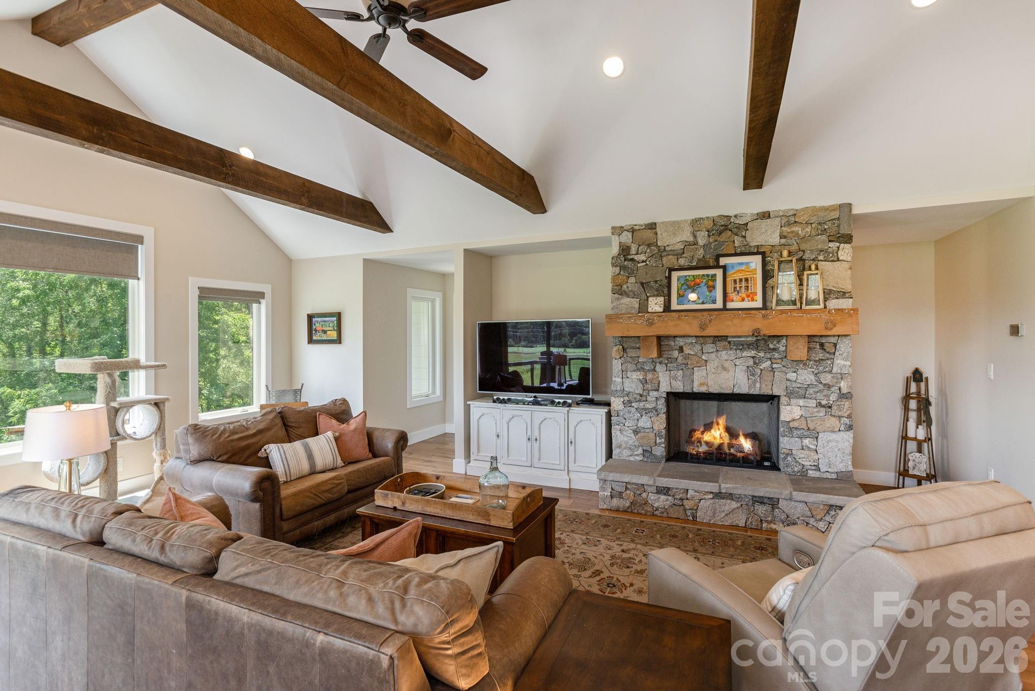 16 School House Road Mills River, NC 28759 - Photo 15 of 48 a living room with furniture and a fireplace
