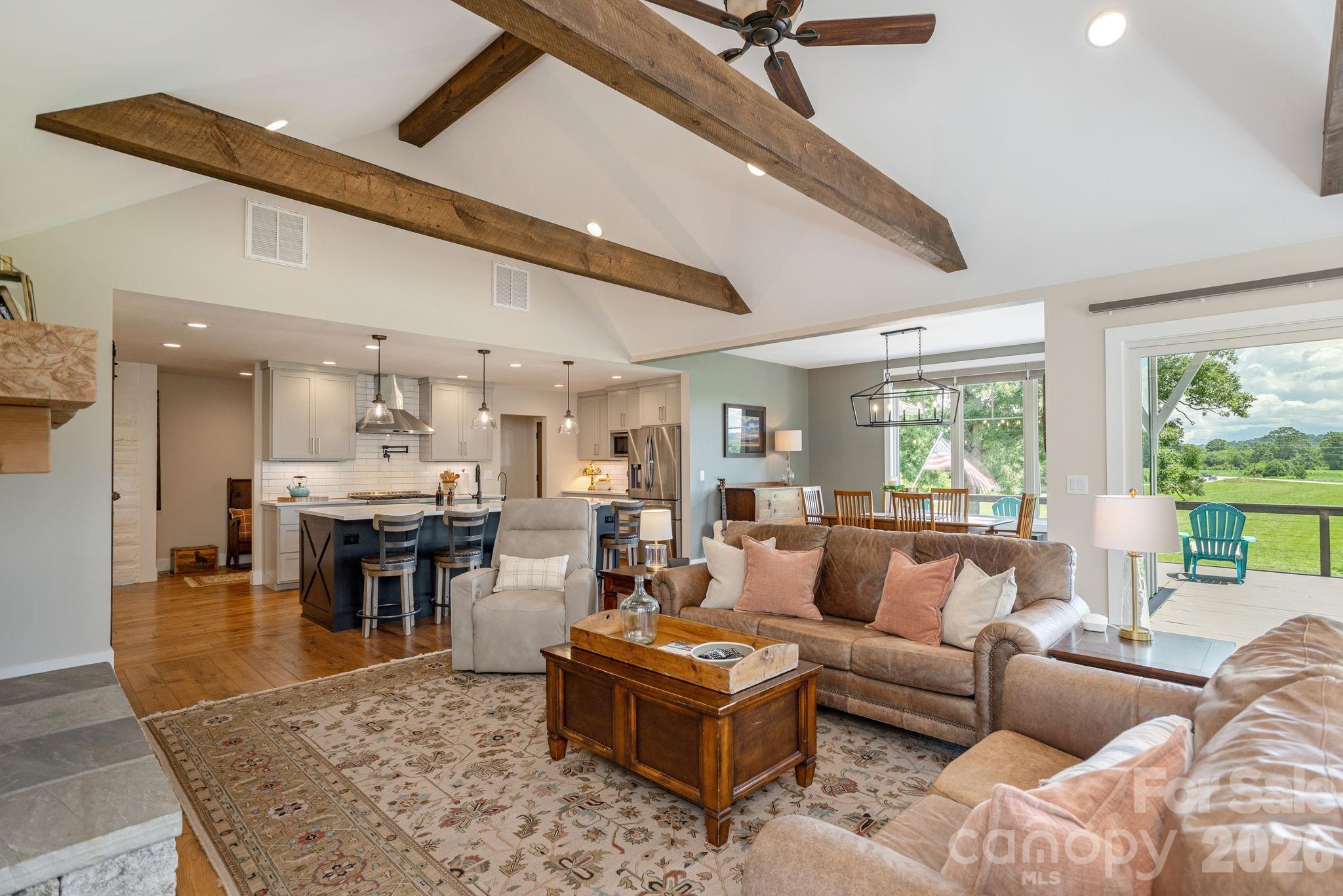 16 School House Road Mills River, NC 28759 - Photo 16 of 48 a living room with furniture and a large window