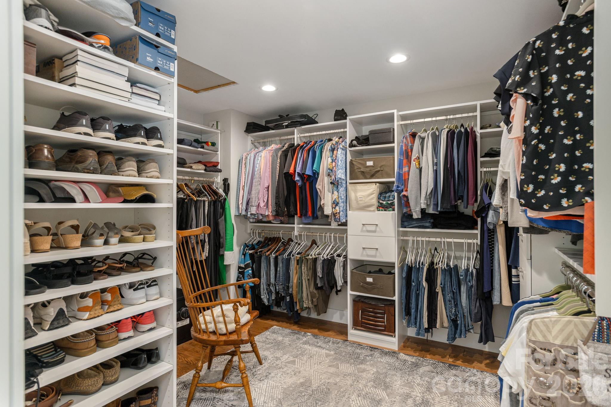 16 School House Road Mills River, NC 28759 - Photo 22 of 48 a view of walk in closet with clothes and shoes
