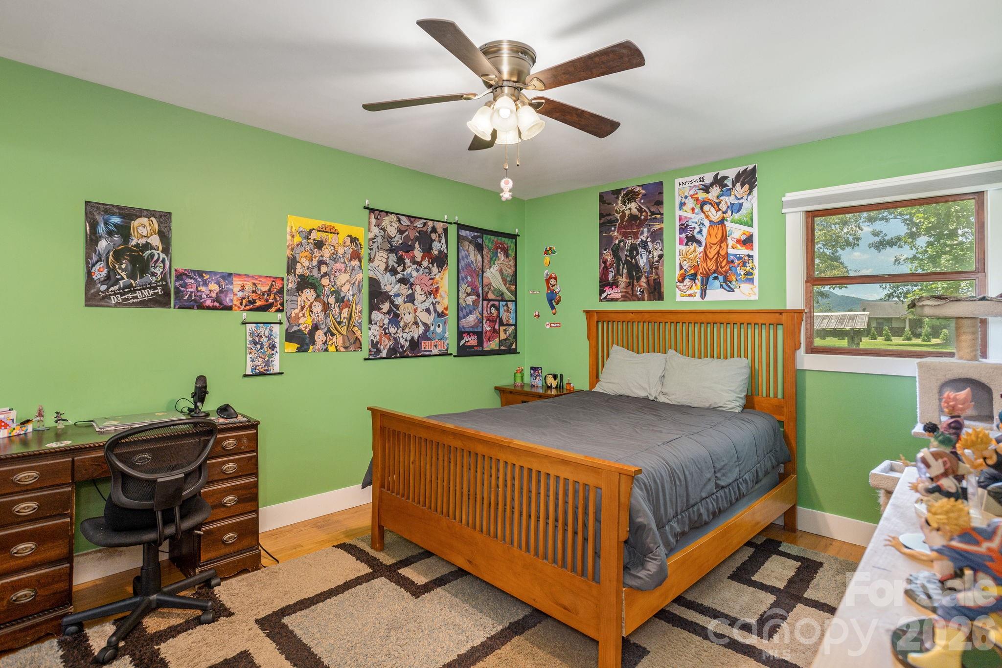 16 School House Road Mills River, NC 28759 - Photo 25 of 48 a bedroom with a bed and windows