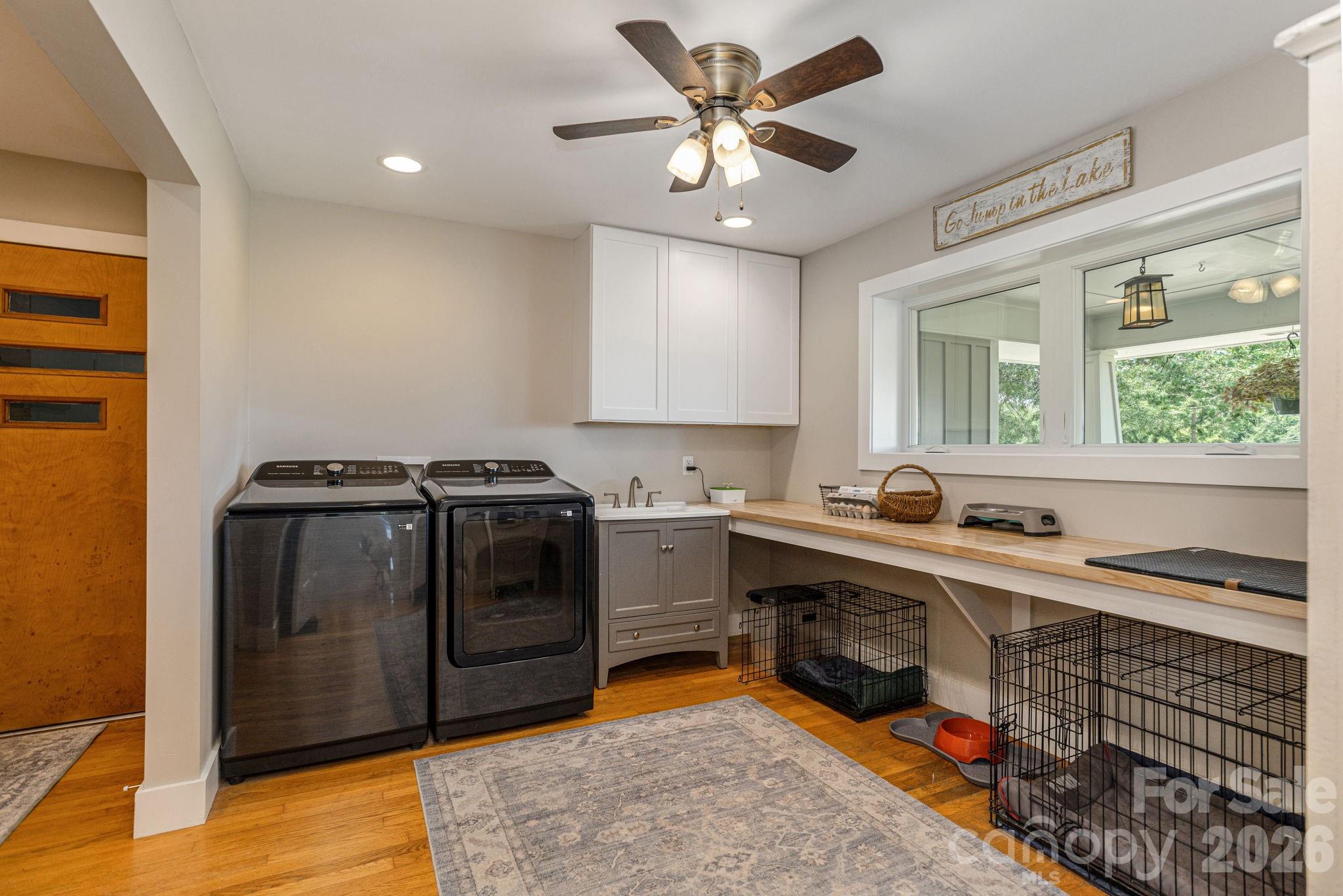 16 School House Road Mills River, NC 28759 - Photo 29 of 48 a kitchen with stainless steel appliances a stove a sink and a refrigerator