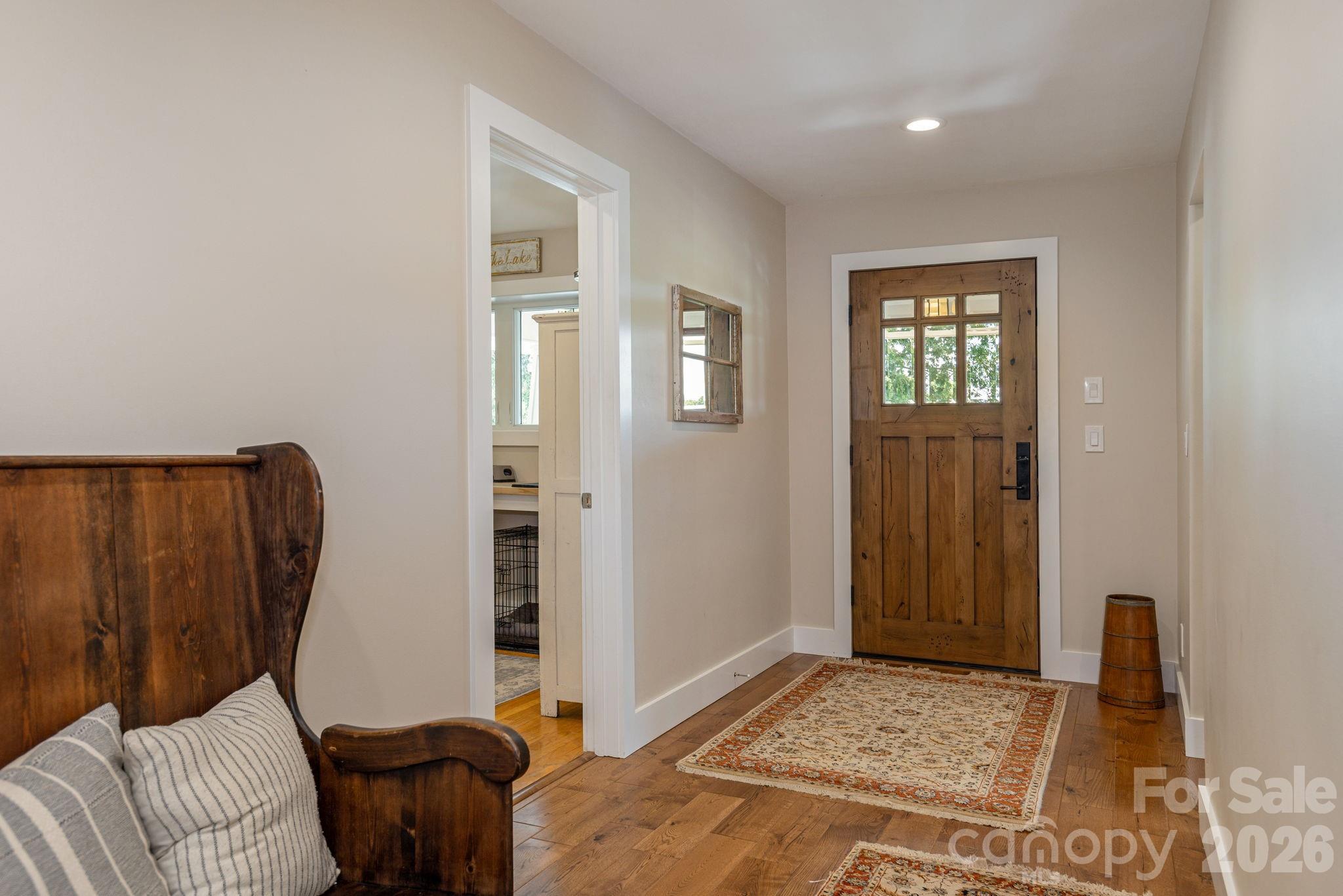16 School House Road Mills River, NC 28759 - Photo 8 of 48 a living room with a couch and a window